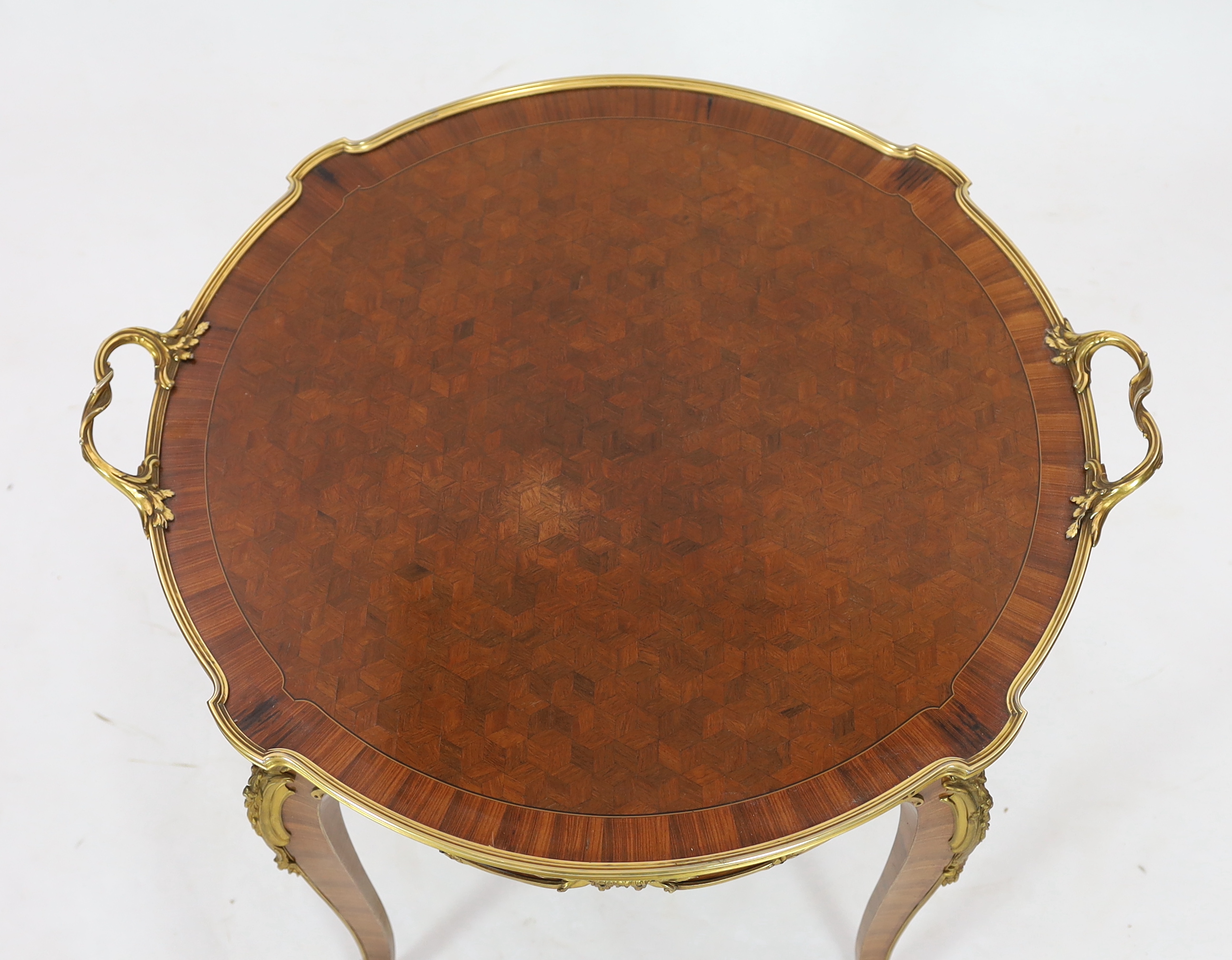 A late 19th century French ormolu mounted kingwood parquetry tray topped table, by Francois Linke, 80 x 72cm, 65cm high, Please note this lot attracts an additional import tax of 5% on the hammer price